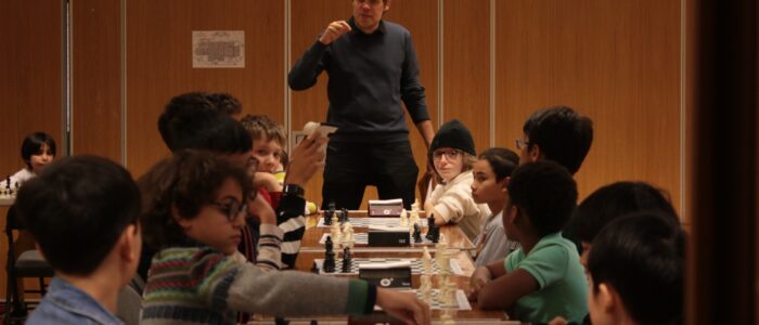 Toni Teaching Tutor teaching kids chess